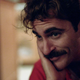Image for article titled Joaquin Phoenix courts his computer in the beguiling Her